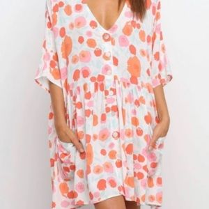 petal and pup v neck dress dress with pockets and bottoms in front. Size S/M